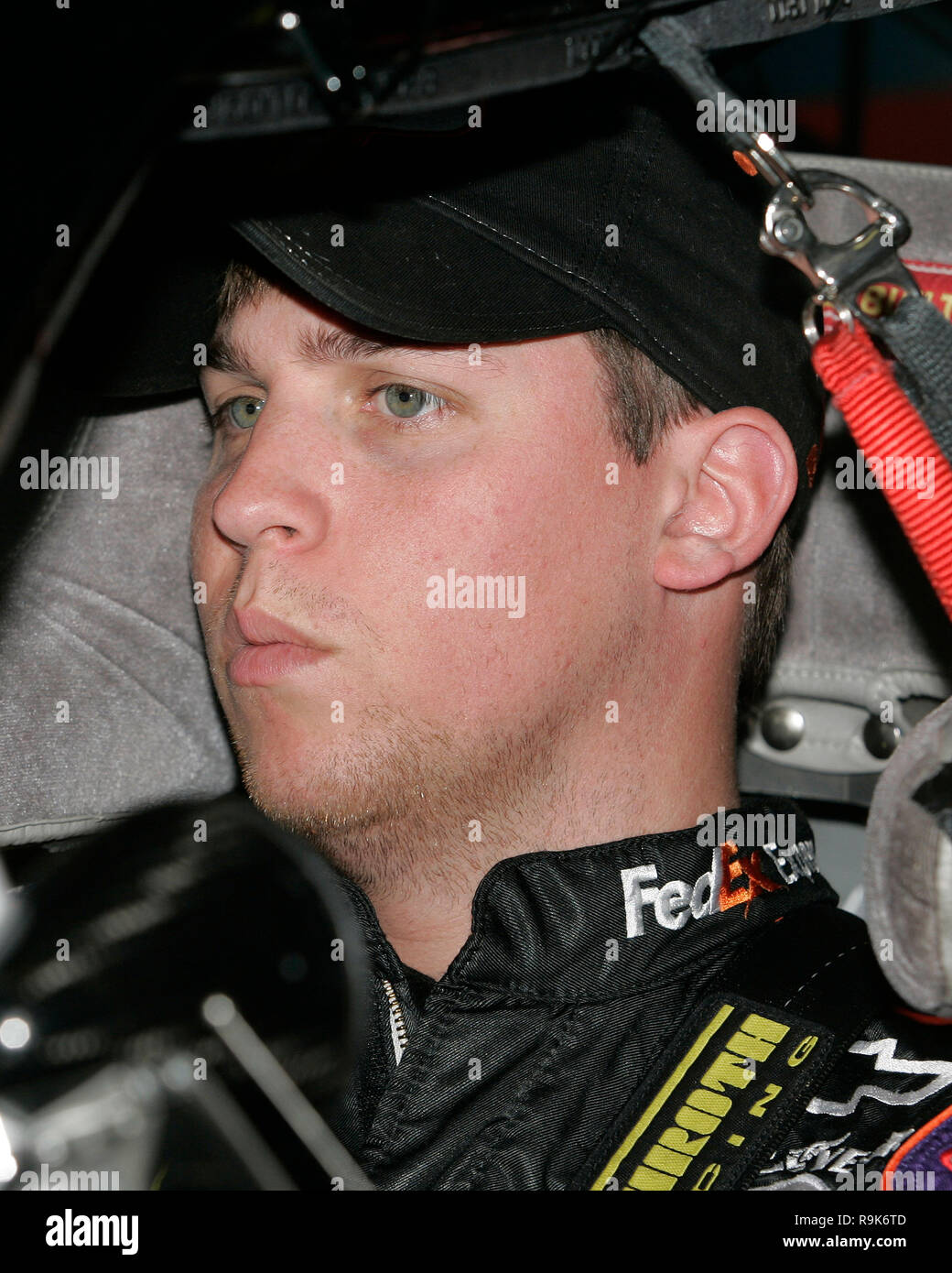 Rookie driver and championship contender Denny Hamlin waits in his car for the Nextel Cup Practice to begin at Homestead-Miami Speedway in Homestead, Florida on November 18, 2006 Stock Photo