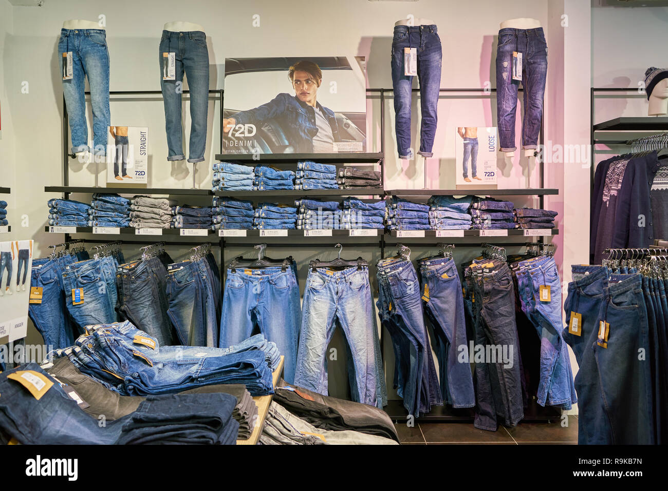 MILAN, ITALY - CIRCA NOVEMBER, 2017: clothing on display at retail store in  Milan Stock Photo - Alamy