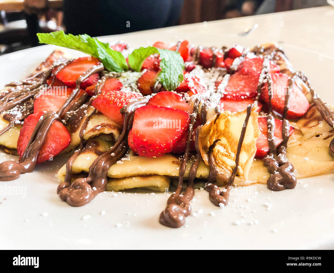 French Style Crepes Cream Crepes with strawberry and nutella Stock