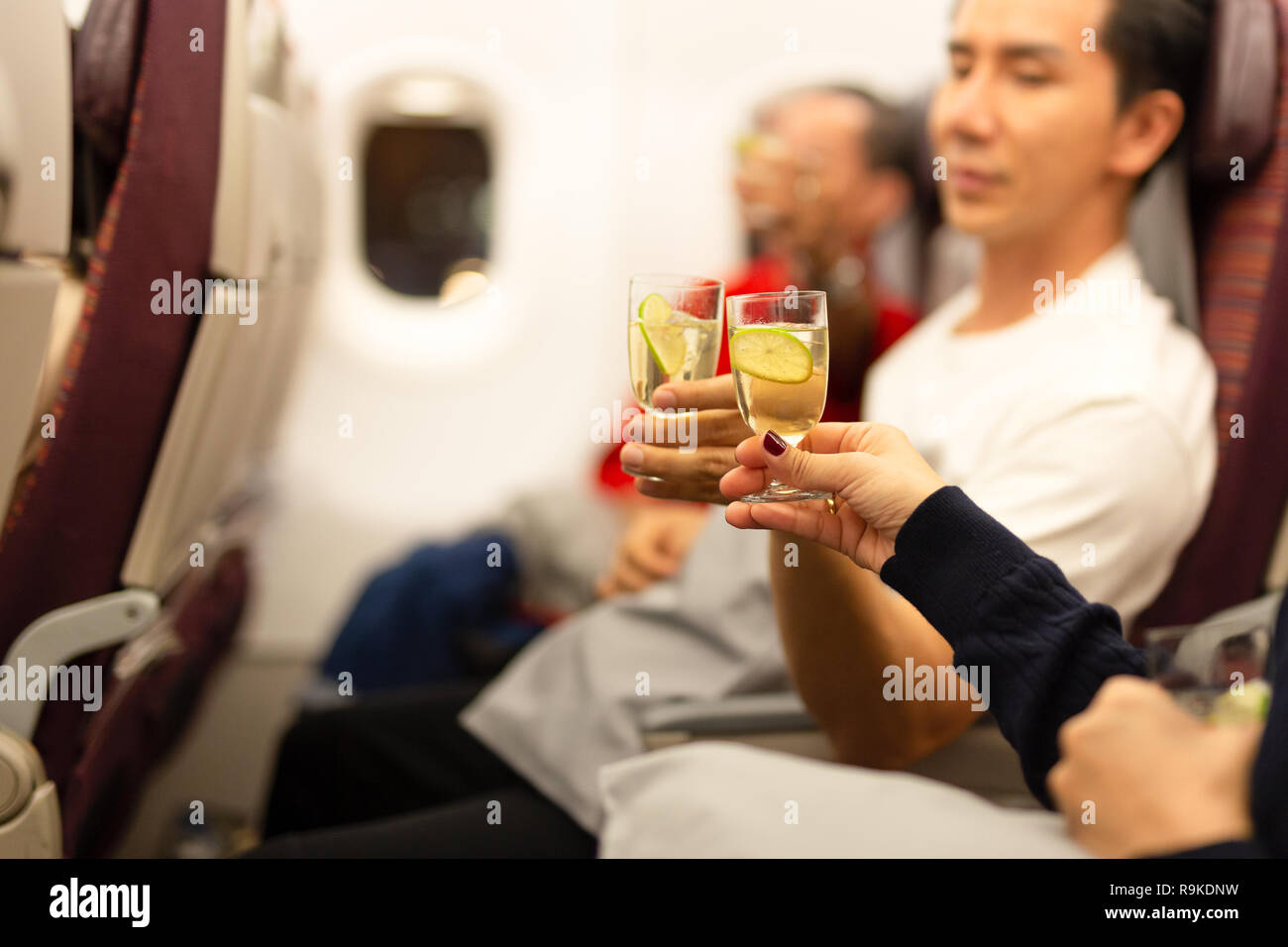 Aeroplane passengers alcohol hi-res stock photography and images - Alamy