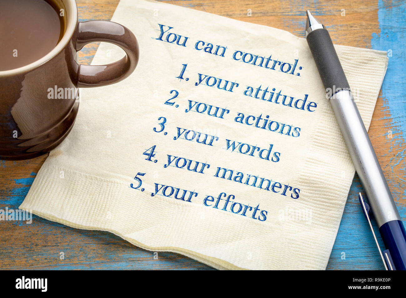 You can control your attitude, actions, words, manners. efforts - handwriting on a napkin with a cup of coffee Stock Photo