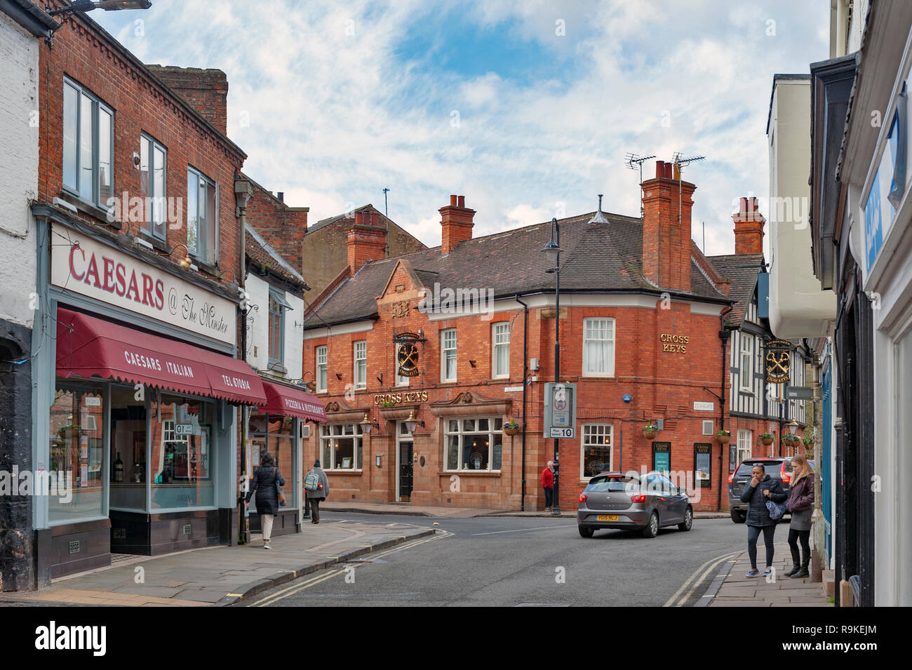 Old building of Cross Keys Restaurant and Nicholson Pubs at corner on Deangate and Goodramgate shopping street in City of York, England, UK Stock Photo