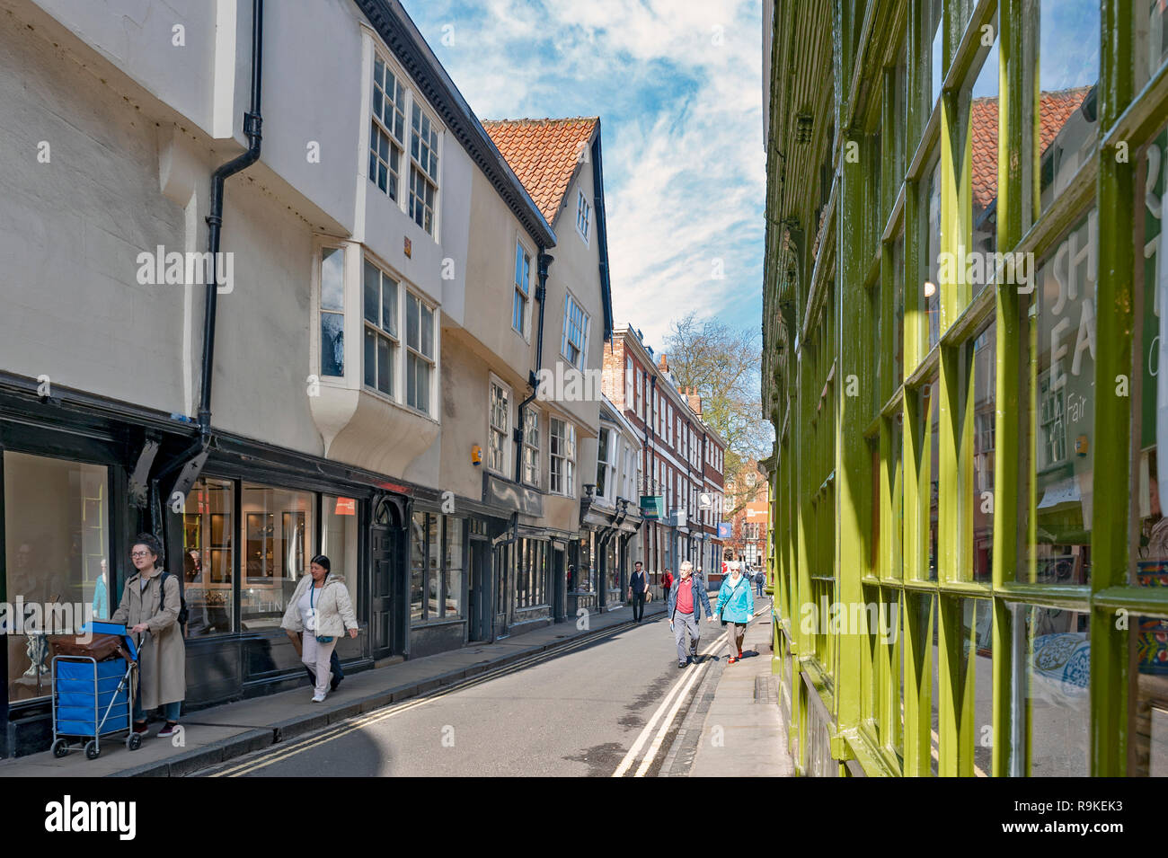 York, England - April 2018: Shops along Minster Gates street near York Minster in historic district of City of York, England, UK Stock Photo