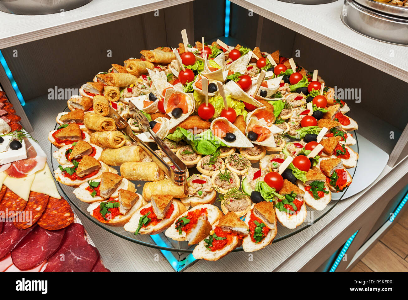 Variety of colorful tasty arranged party finger food - cold buffet Stock Photo