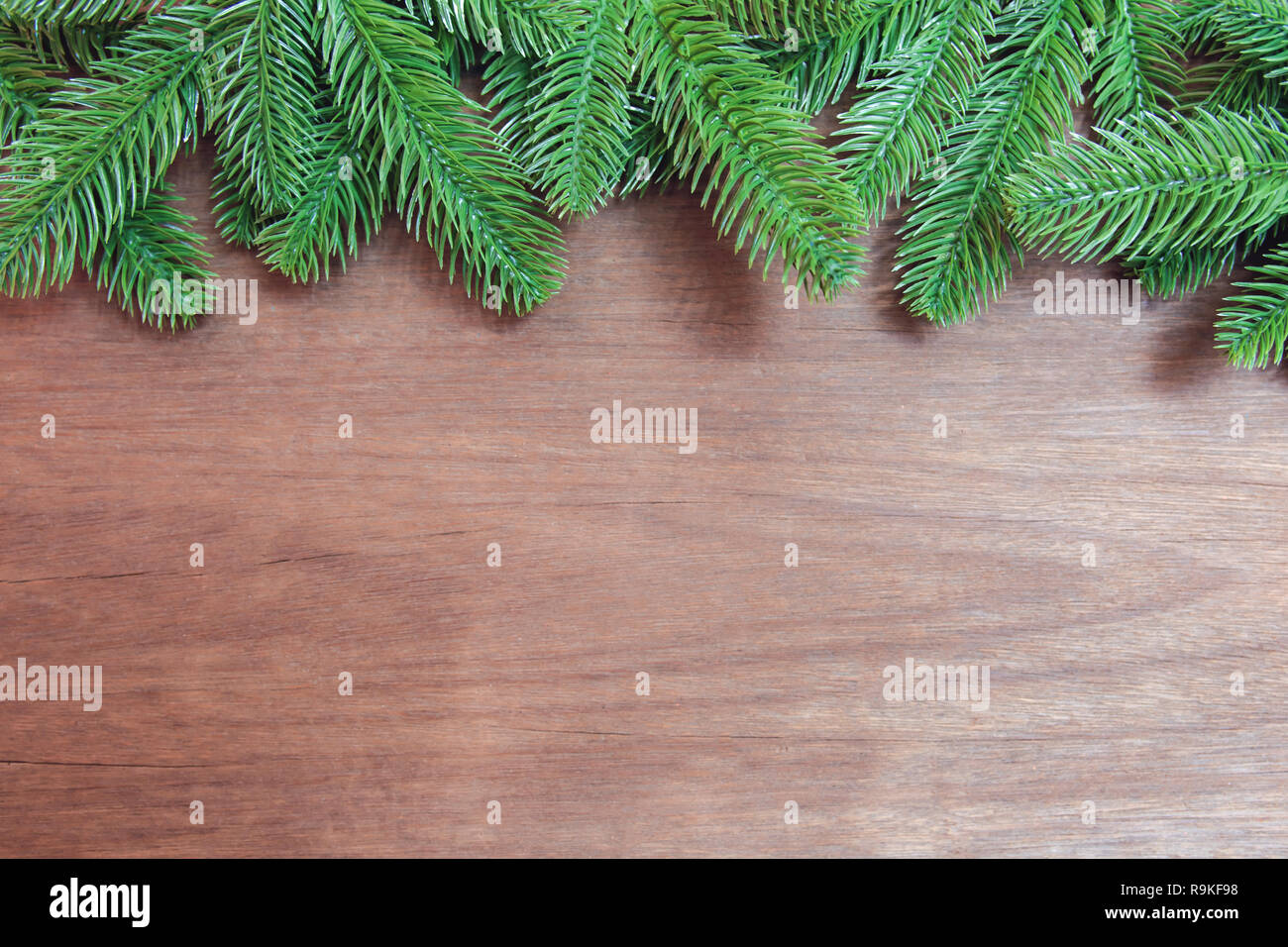 Christmas background. Fir tree branches and pine cones with decoration ...