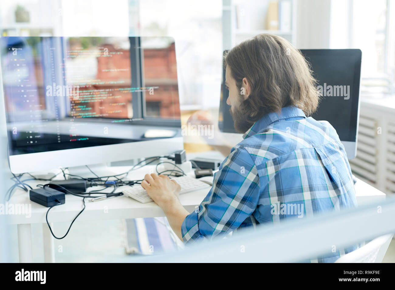 Programmer at work Stock Photo - Alamy