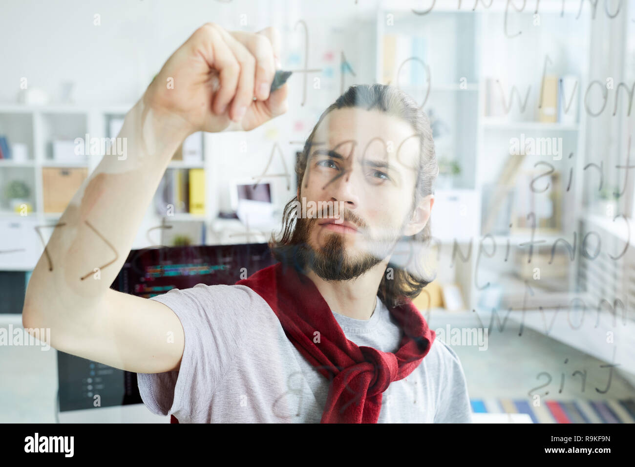 Programmer by board Stock Photo