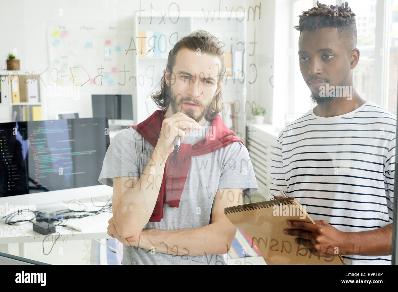 Guys by board Stock Photo