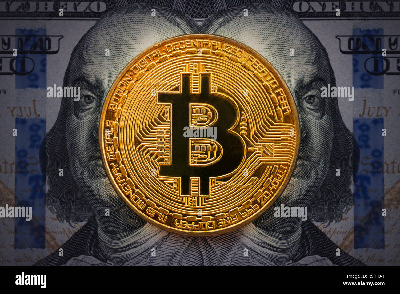 Golden bitcoin with evil, wicked Benjamin Franklin portrait from one  hundred american dollars. Business concept of worldwide cryptocurrency.  Earnings Stock Photo - Alamy