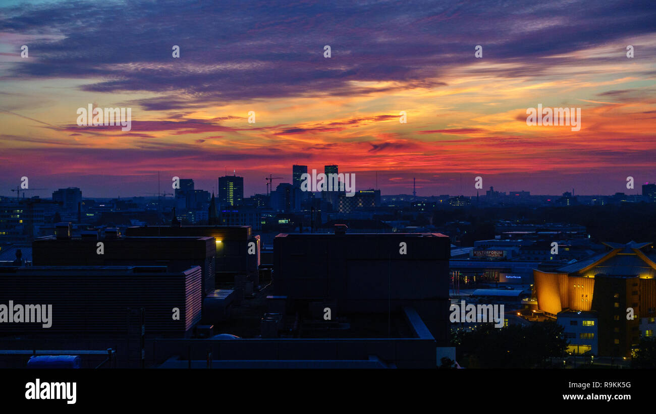 BERLIN, GERMANY - OCTOBER 8, 2018: Spectacular sunset seen from Potsdamer Platz in Berlin, Germany on October 8, 2018. Stock Photo
