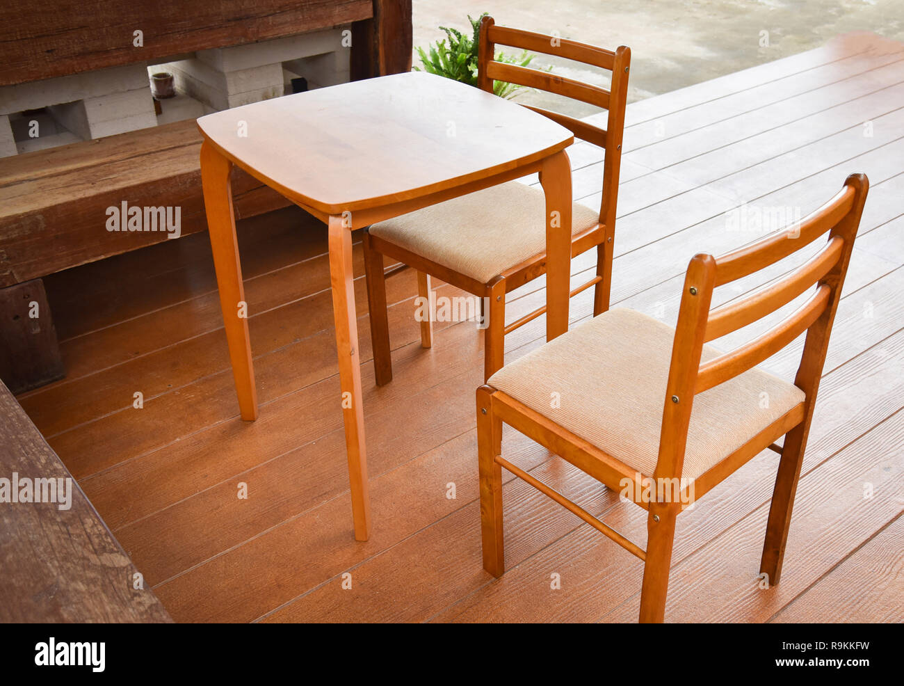 Set of wooden table and chairs at home Stock Photo Alamy