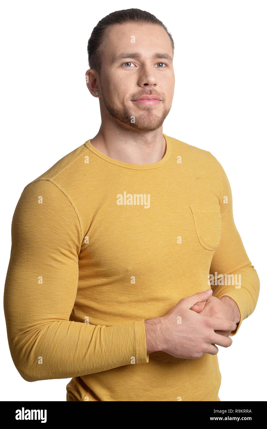 Handsome young man posing isolated on white background Stock Photo - Alamy