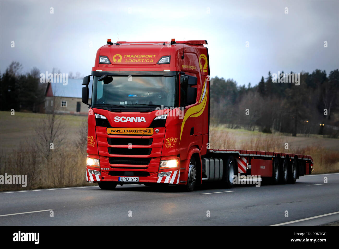 Salo, Finland - December 14, 2018: Red Next Generation Scania S500 semi trailer of Translog for oversize load transport drives on highway in Finland. Stock Photo