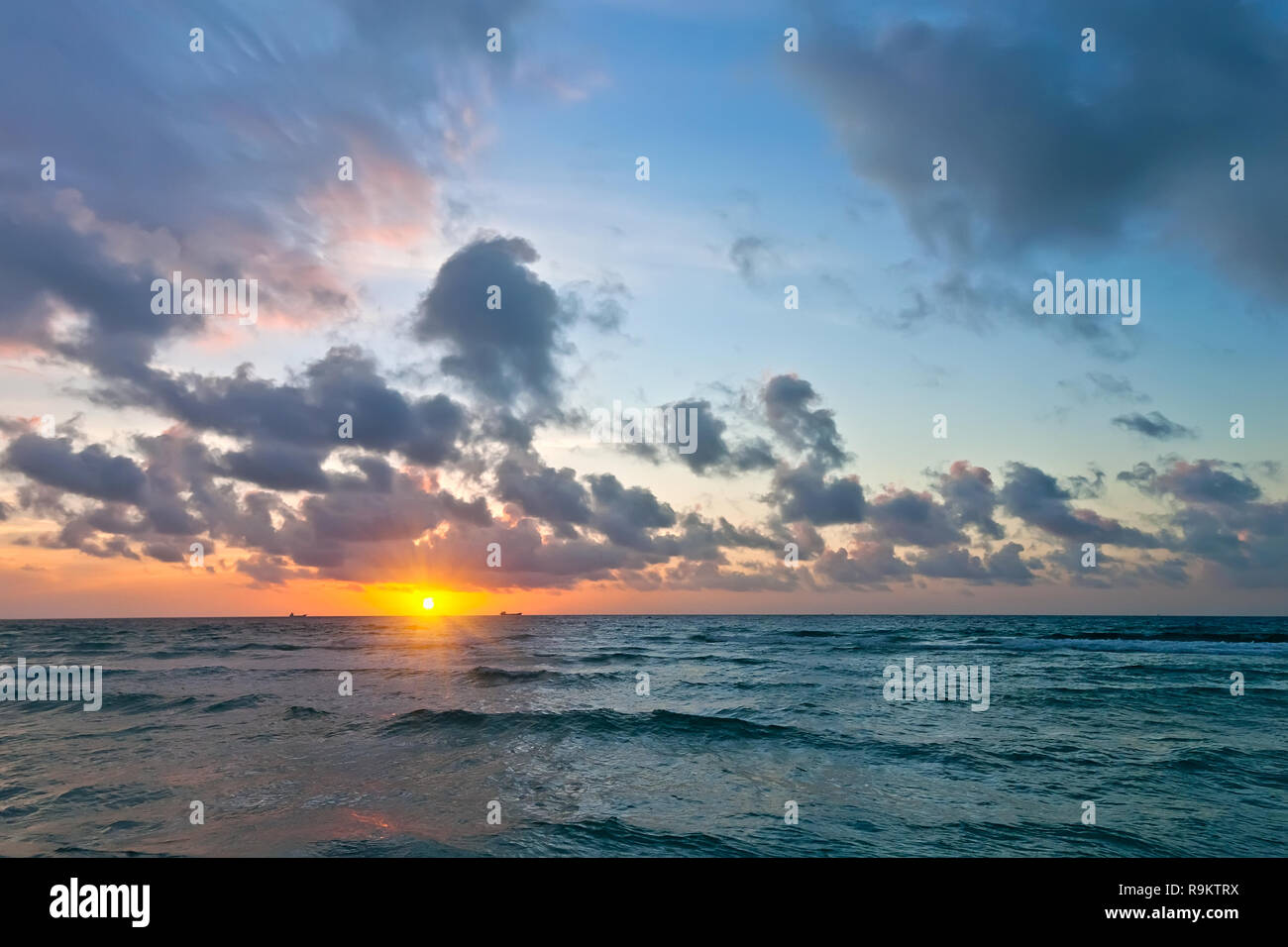 Sunrise over Atlantic ocean Stock Photo - Alamy