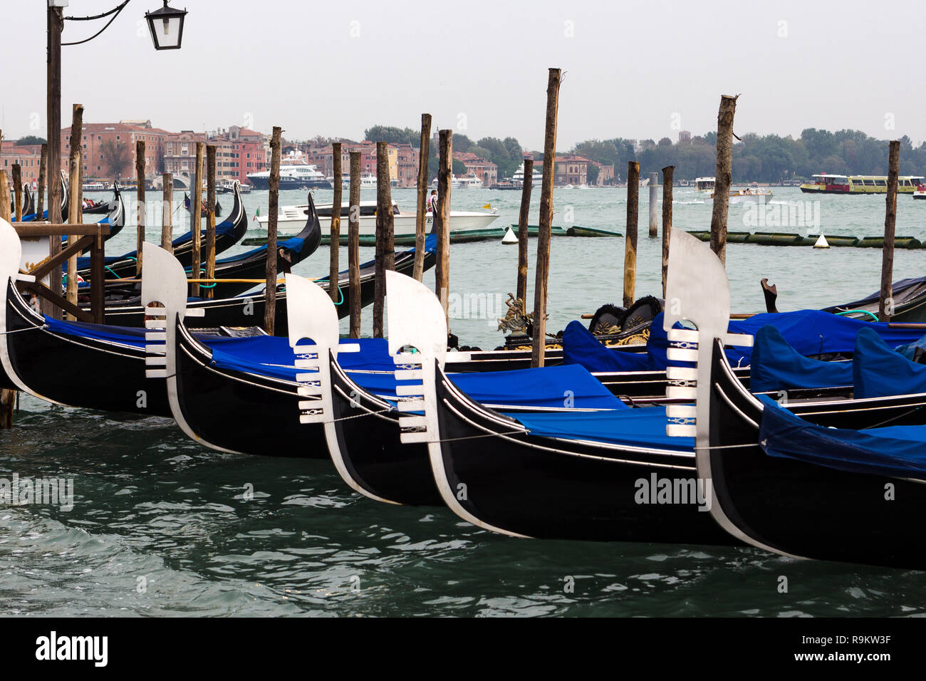 Venice. Rainy weather. Italy. Tied up gondolas Italy Stock Photo