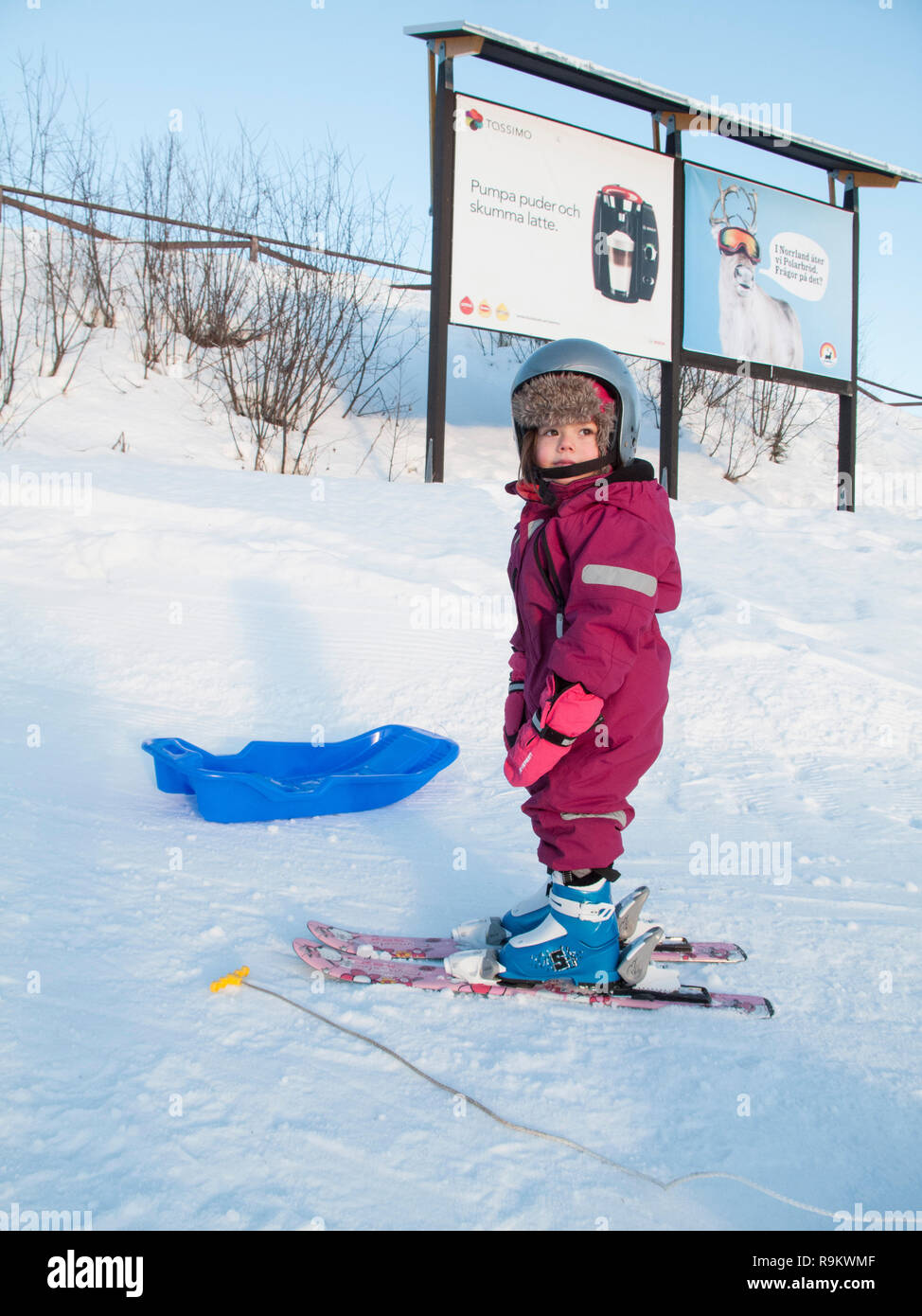 A three years old girl on skis Stock Photo Alamy