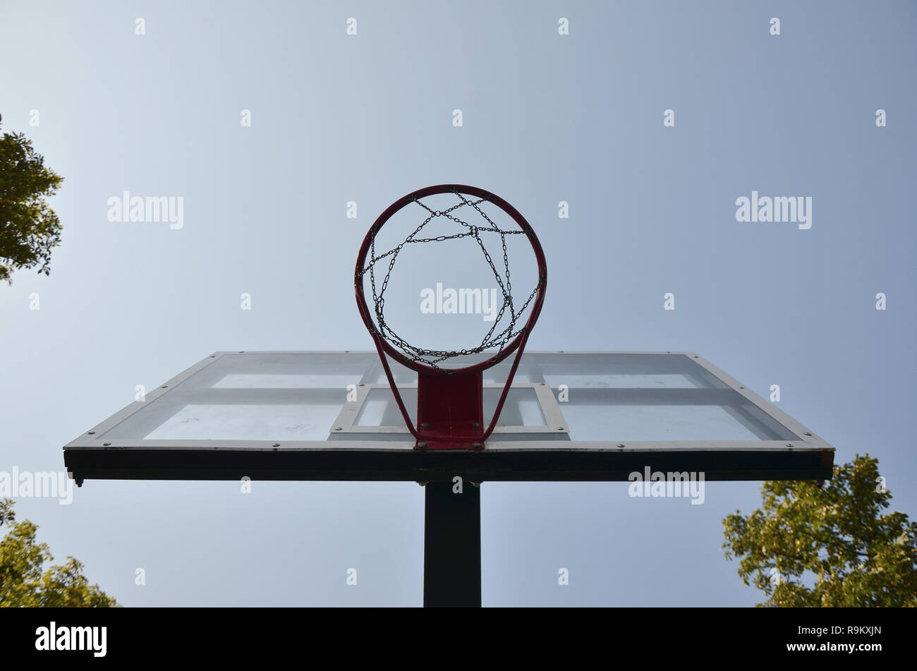 Outdoor Basketball backboard with clear blue sky Stock Photo Alamy