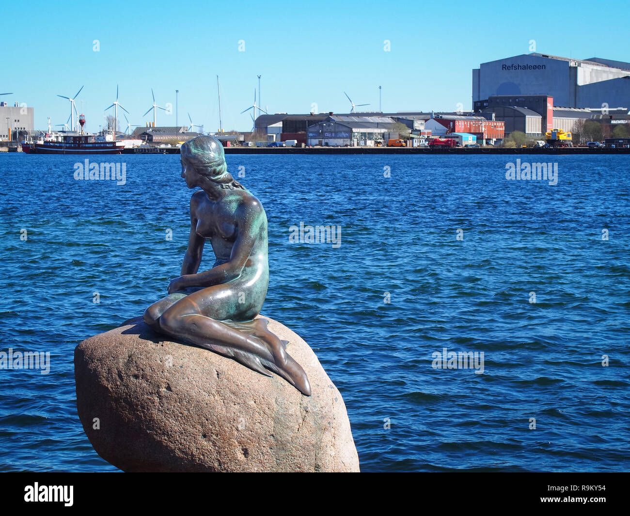 COPENHAGEN, DENMARK-APRIL 11, 2016: Bronze statue of the Little Mermaid by Edvard Eriksen Stock Photo