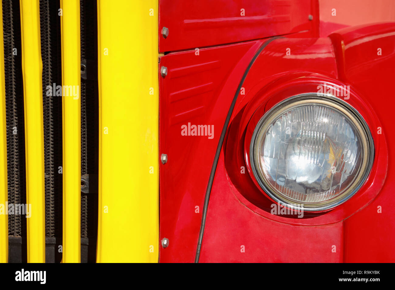 Old car red and yellow, front, close-up Stock Photo - Alamy
