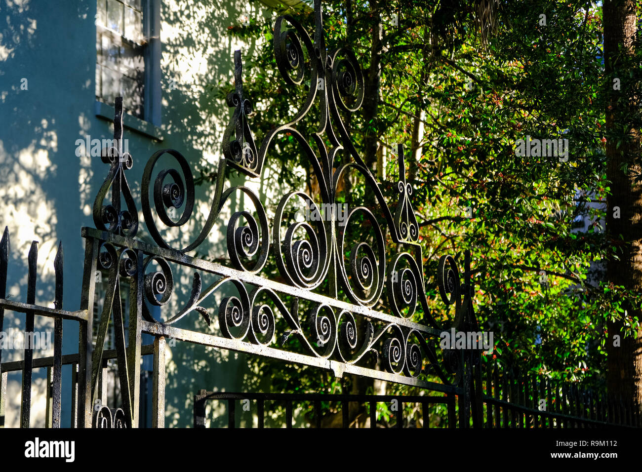 A decorative iron gate on a historic home along Lagare Street in Charleston, South Carolina. Stock Photo
