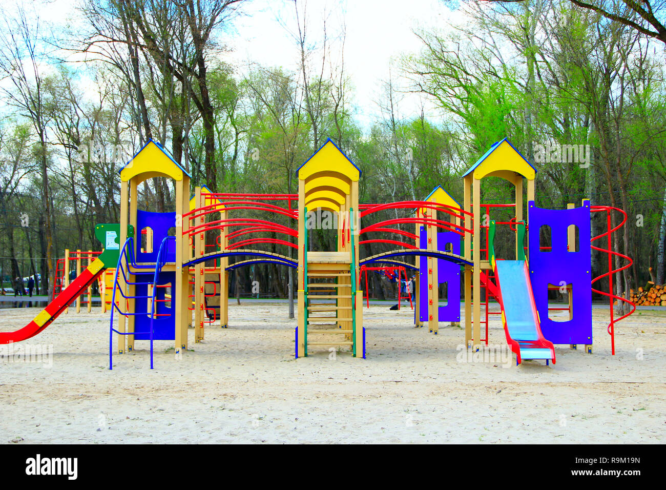 Childish Playground In City Park Swing Carousel In Park For