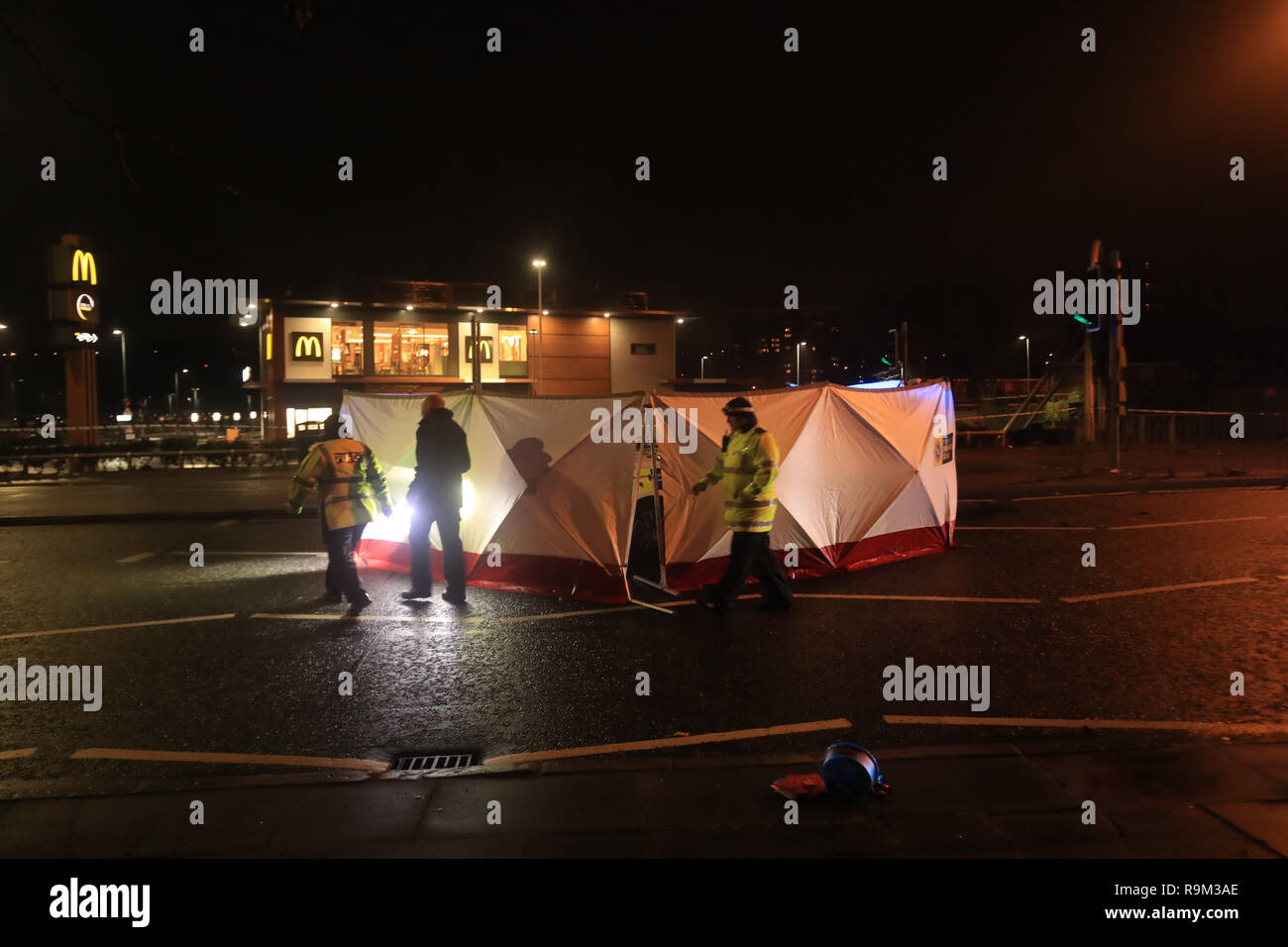 A screen surrounds a police vehicle at the scene of an accident on Scotland Road near the Wallasey Tunnel in Liverpool where a man has died after being hit by a police car on Christmas night. Stock Photo