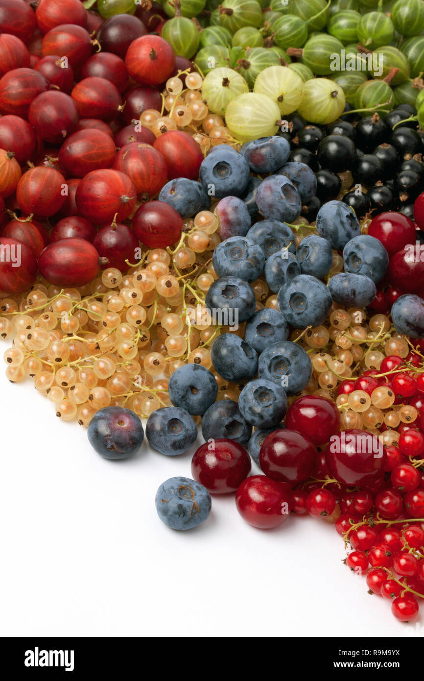 Different berries isolated on the white background. Stock Photo