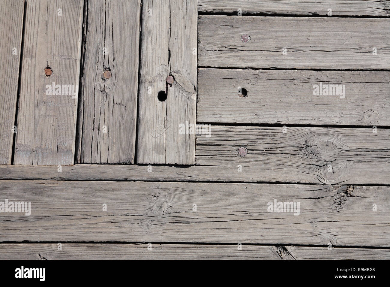 Wooden surface from old boards with nails Stock Photo