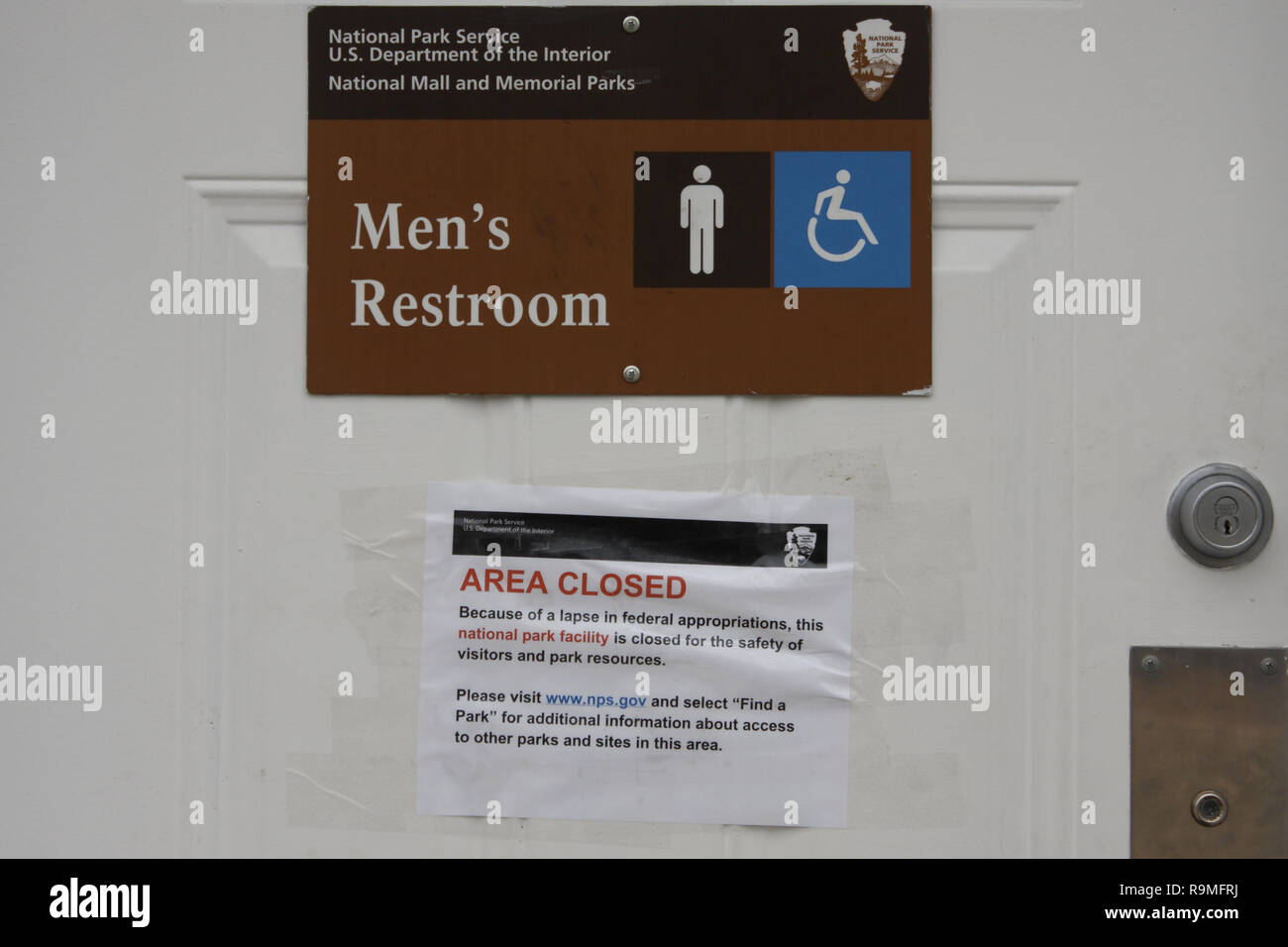 Washington, DC, USA. 25th Dec, 2018. On Day 4 of the Partial Federal Government Shutdown, while there were not barriers around NPS sites as there were during the October 2013 shutdown, some facilities were closed due to the lapse in funding. Here the Men's Restroom at the Washington Monument Lodge is seen with a sign on the door indicating that it is closed. Credit: Evan Golub/ZUMA Wire/Alamy Live News Stock Photo