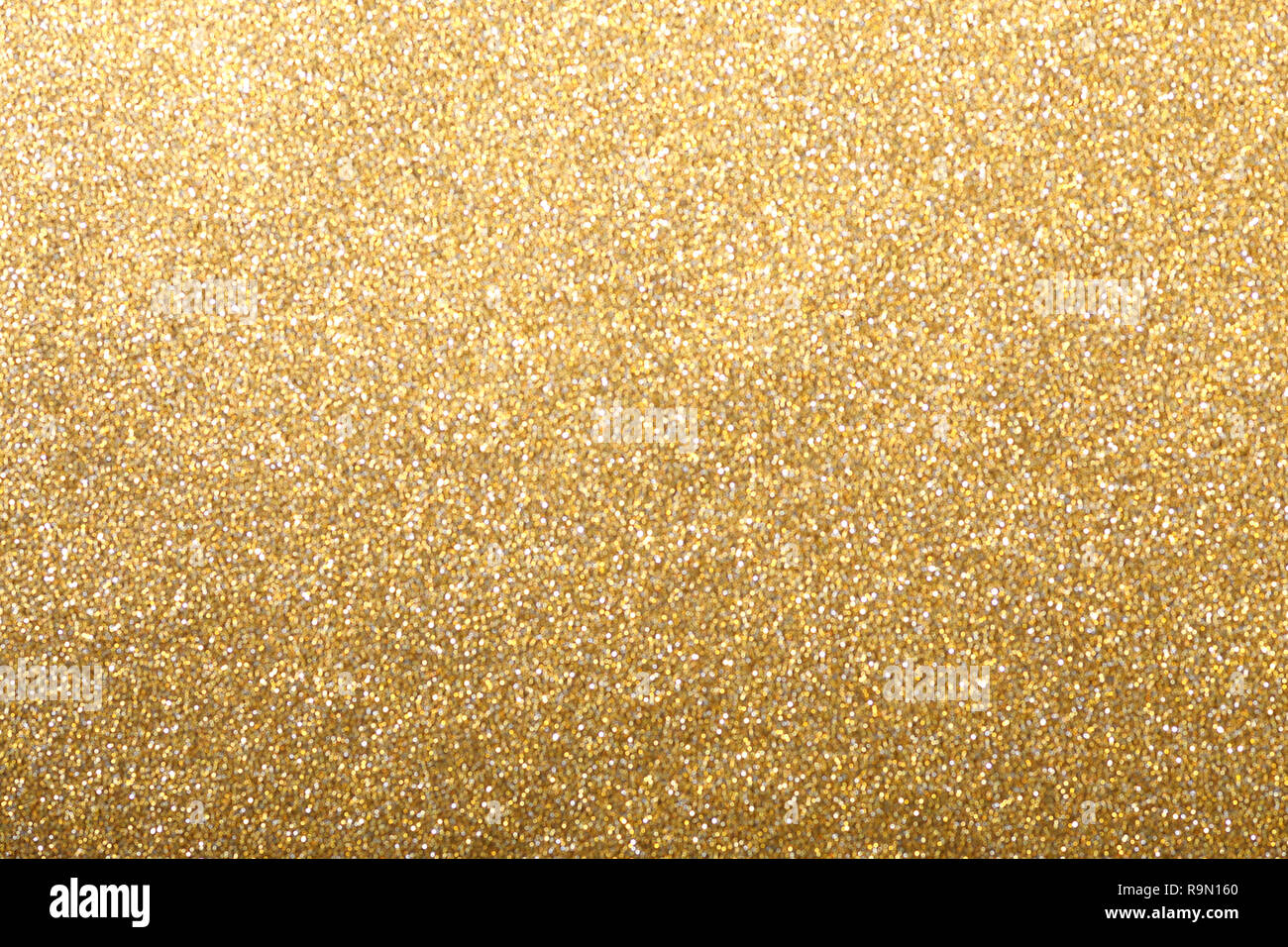https://c8.alamy.com/comp/R9N160/gold-silver-glitter-background-shiny-wrapping-paper-defocus-R9N160.jpg
