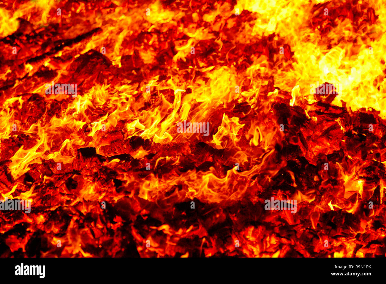 Fire. Volcano incandescent material. Hot charcoal bonfire. Carbon