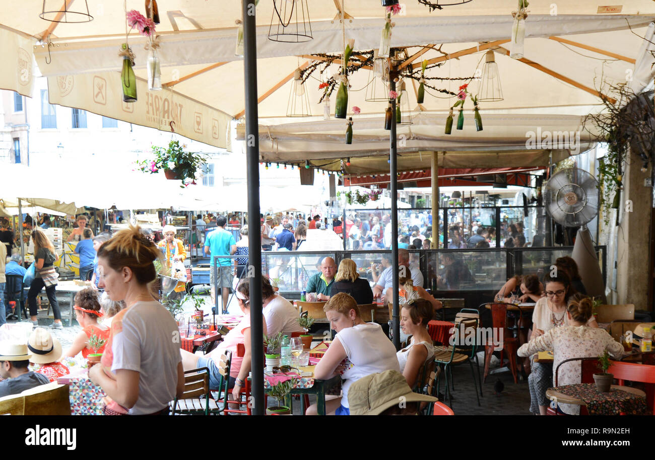 Busy restaurants and cafes around Campo de' Fiori sq. in Rome Stock