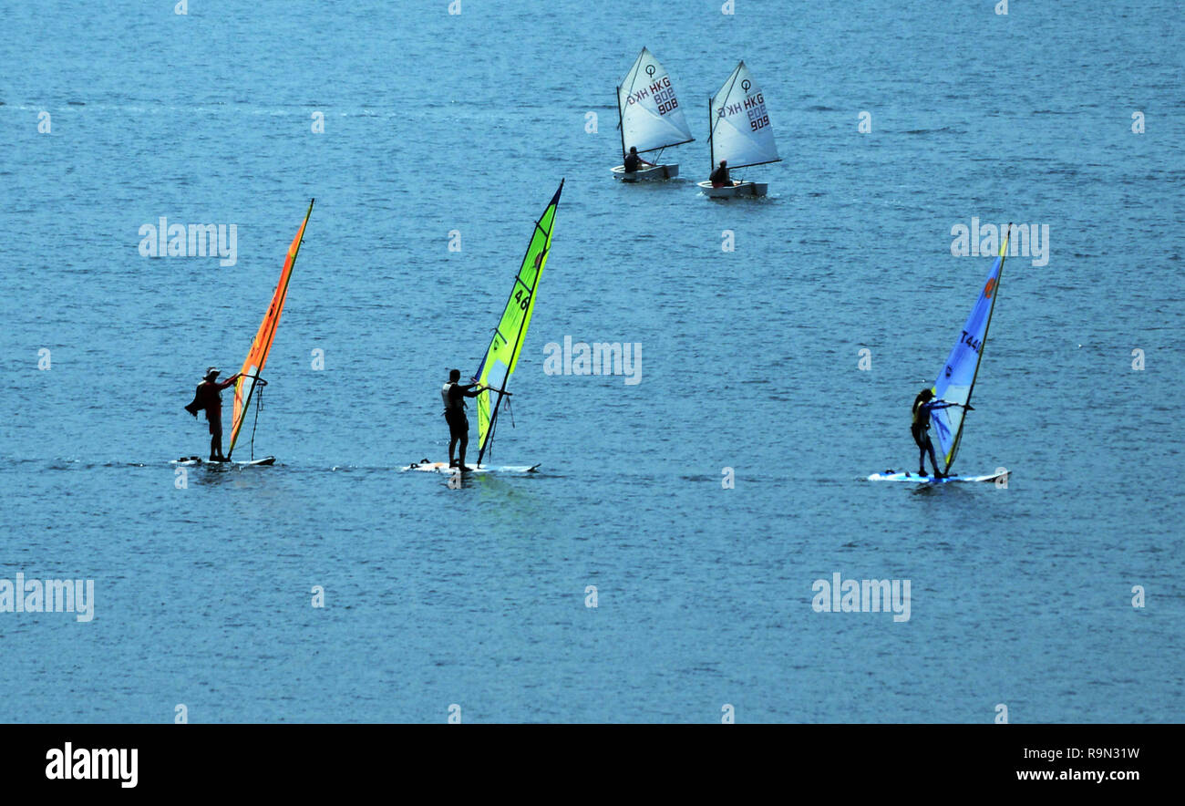 Windsurfing in Hong Kong's Tolo harbour. Stock Photo