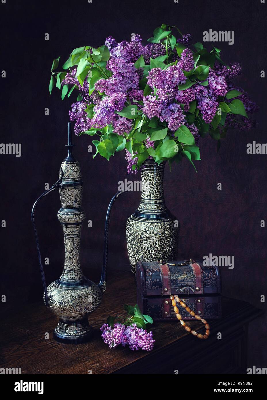 Still life with bouquet of lilac Stock Photo - Alamy