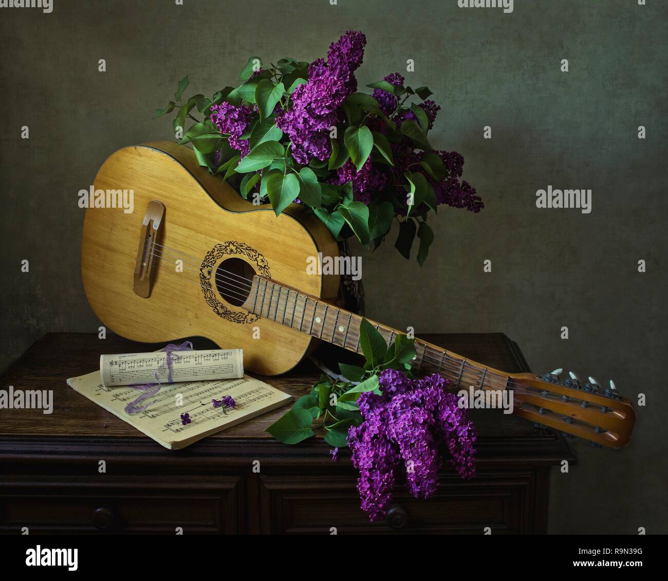 Still life with bouquet of lilac Stock Photo - Alamy