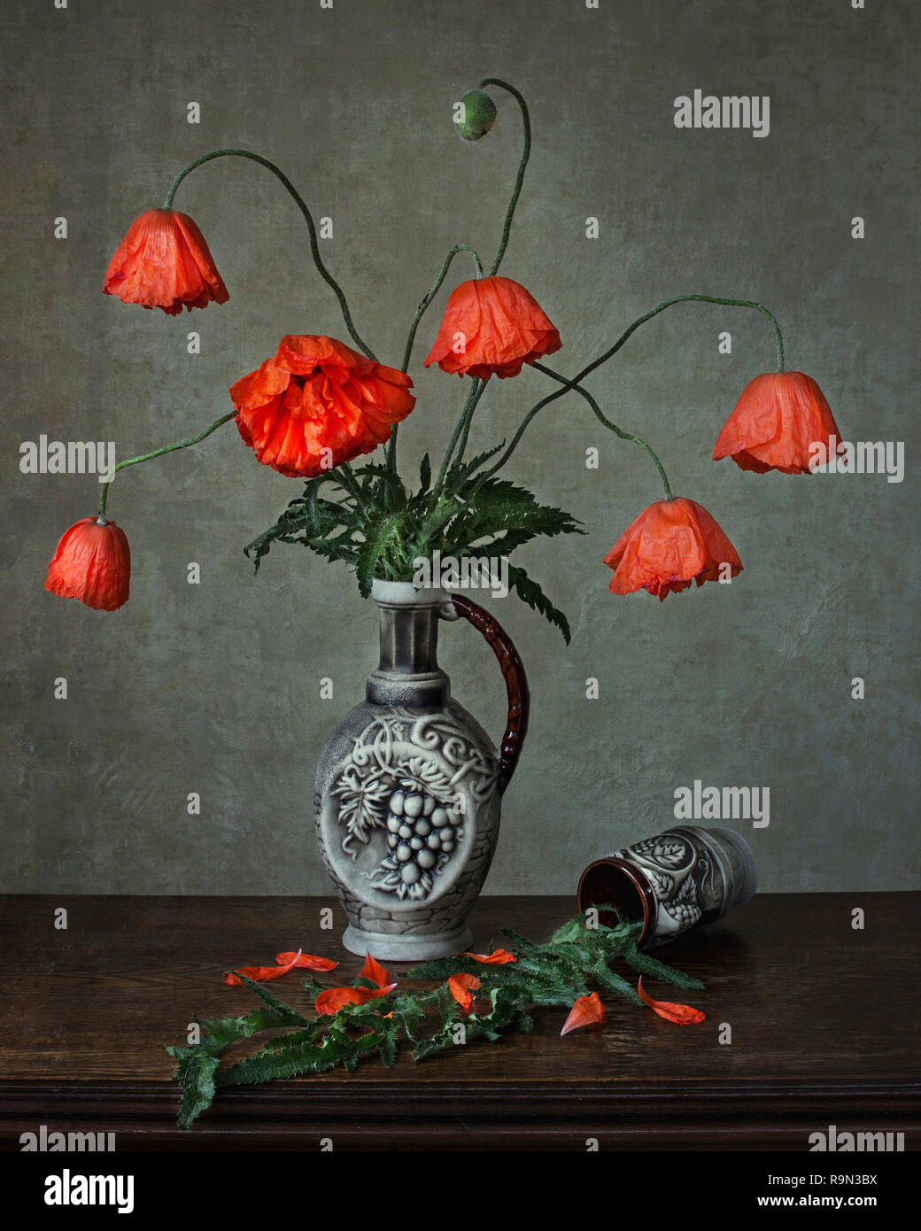 Still life with bouquet of red garden poppies flowers Stock Photo - Alamy