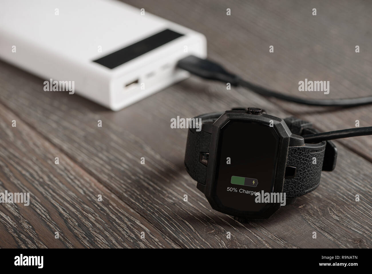 Smart watch charging Stock Photo Alamy