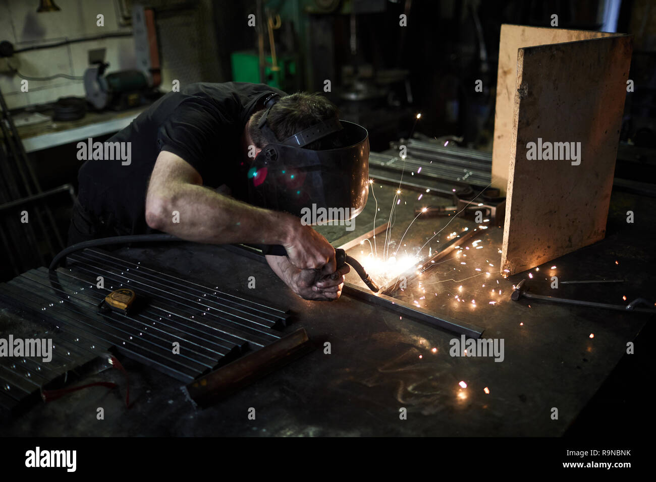 Using welding torch Stock Photo Alamy