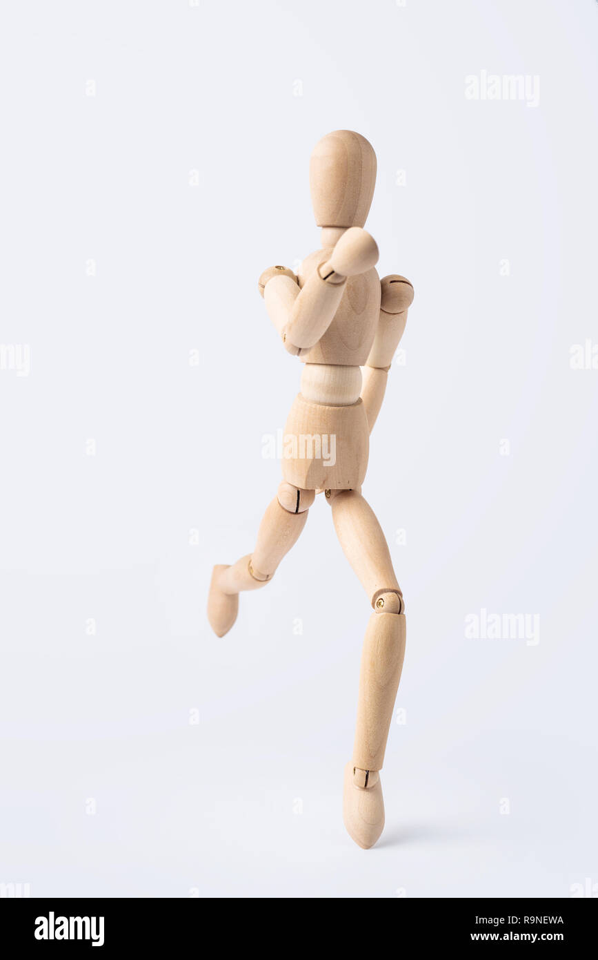 Wooden Running Mannequin Isolated On White High-Res Stock Photo - Getty  Images