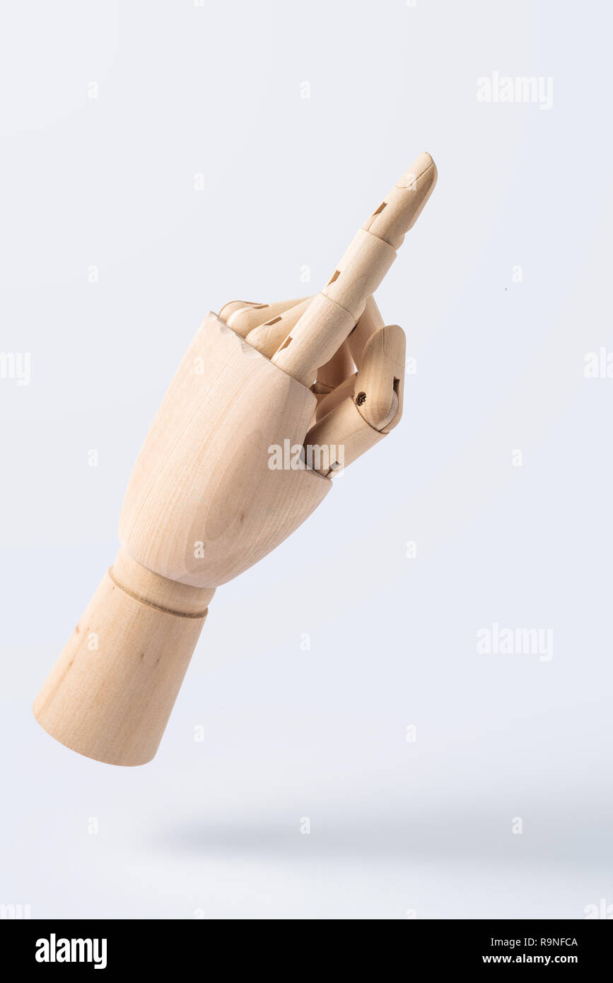 Wooden hand mannequin front side on white background Stock Photo - Alamy