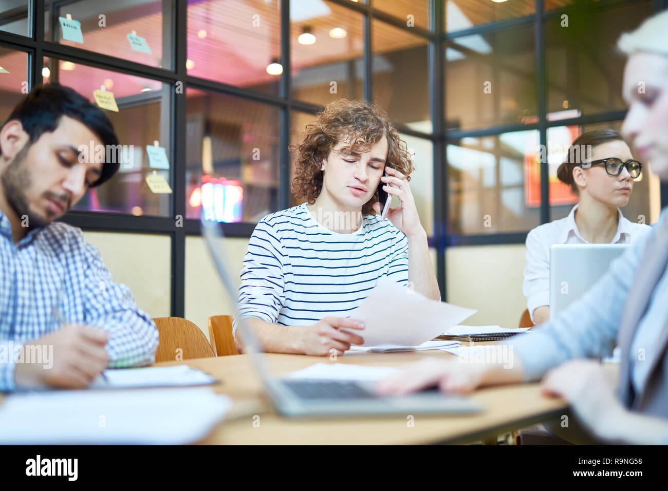 Busy office workers Stock Photo - Alamy