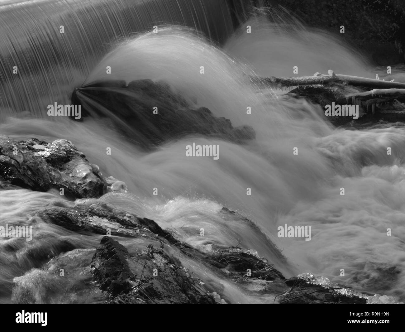 Black and white long exposure of stream in Franklin, Sussex County, NJ. Located about 50 miles from New York City. Stock Photo