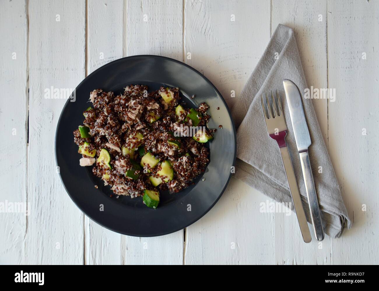 Healthy plate red quinoa with zucchini and tuna, complete dish with all macronutrients Stock
