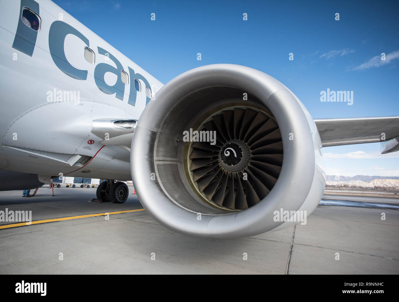 Commercial Passenger Jet Engine on an Aircraft at an Airport Stock Photo