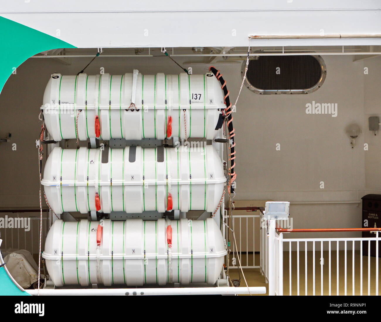 A stack of white Ration Barrels on a Luxury Cruise Ship Stock Photo - Alamy
