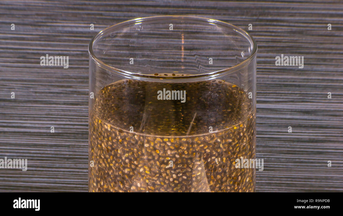 Chia seeds soaked in water inside a clear glass Stock Photo Alamy