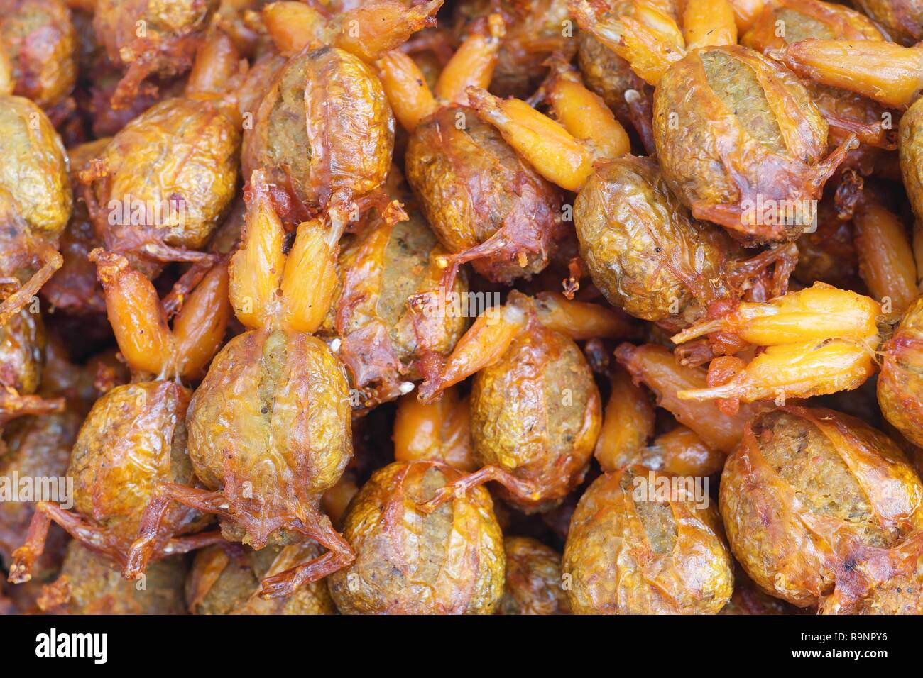 Fried pork-stuffed frogs meat. The fried rice field frogs are filled with  minced pork before being fried Stock Photo - Alamy