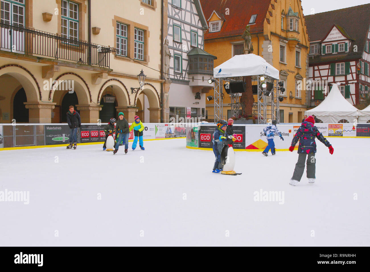 Sigmaringen, Baden-Wurttemberg, Germany - Jan 07, 2018: Ice skating rink on street of medieval town Stock Photo