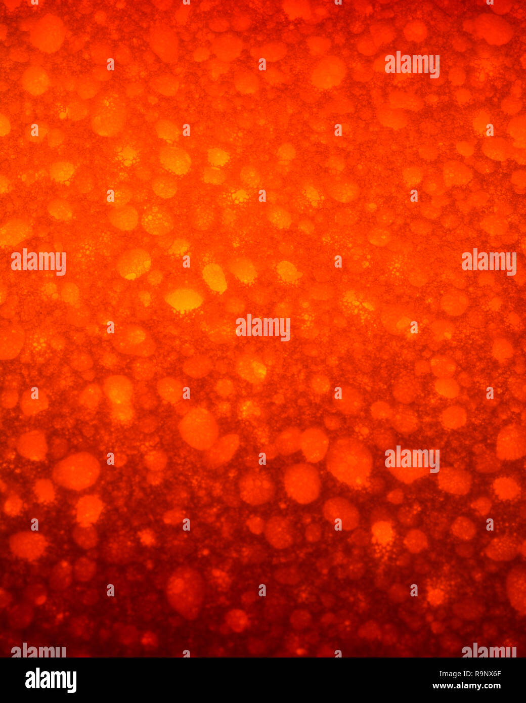 Macro close-up of artificial polymer sponge pores (maybe polyester or polypropylene). For sponging, cleaning, absorbing, war on plastic, red anger Stock Photo