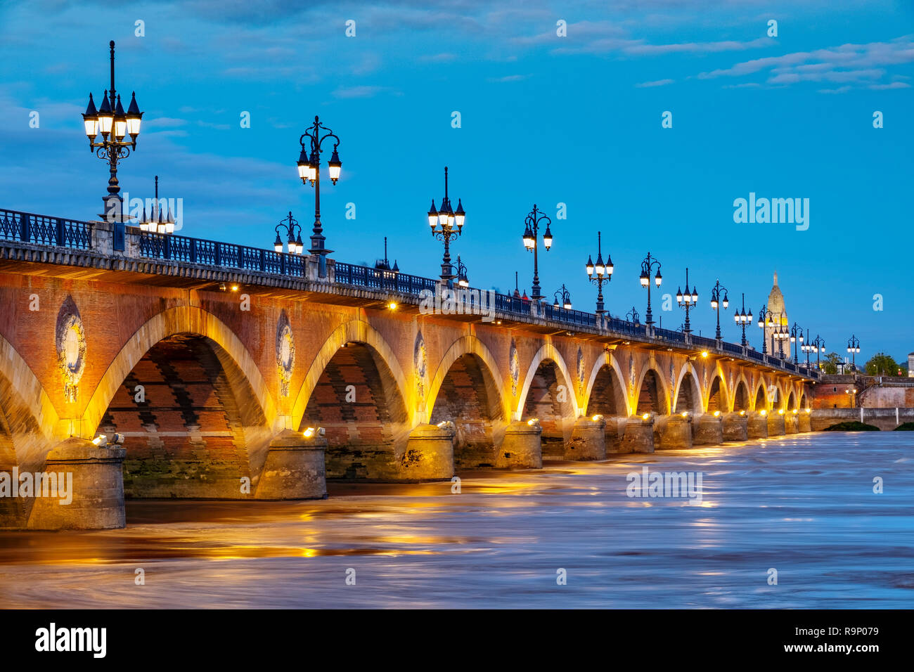 Pont de Pierre at dusk. Stone Bridge & Garonne River. Bordeaux, Gironde